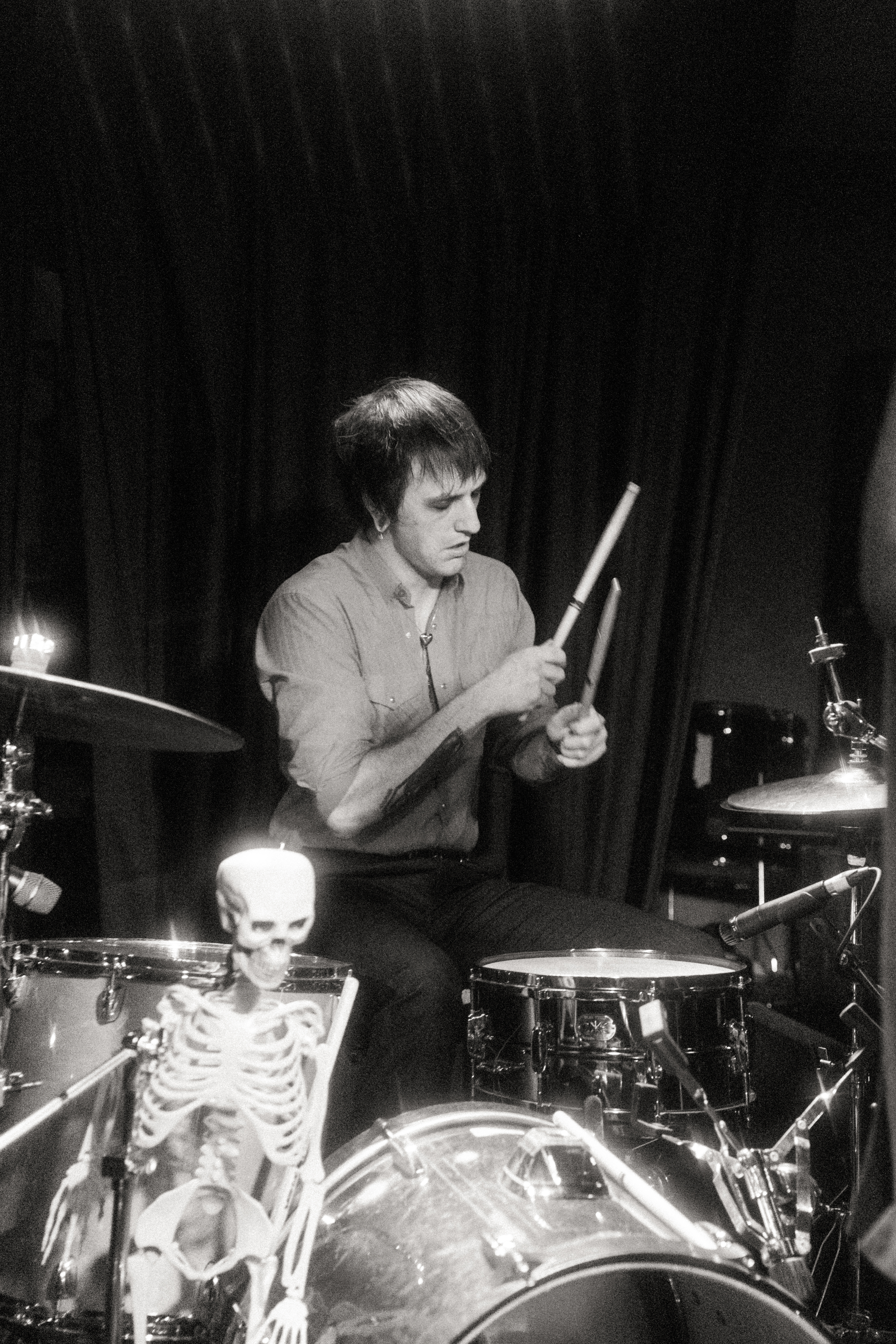 Etiquette drummer during a live set